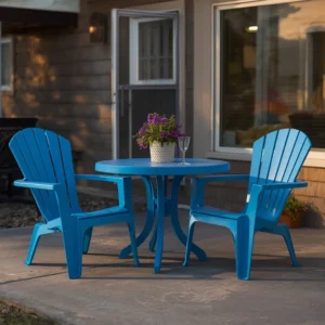 Restored faded plastic patio furniture set showing vibrant color after DIY treatment.