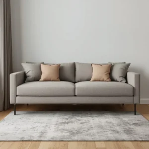 Floating sofa and rug showing how to arrange small living room seating away from the wall.
