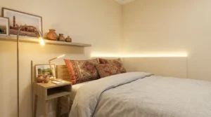 Three layered light sources used to brighten dark windowless bedroom spaces evenly.